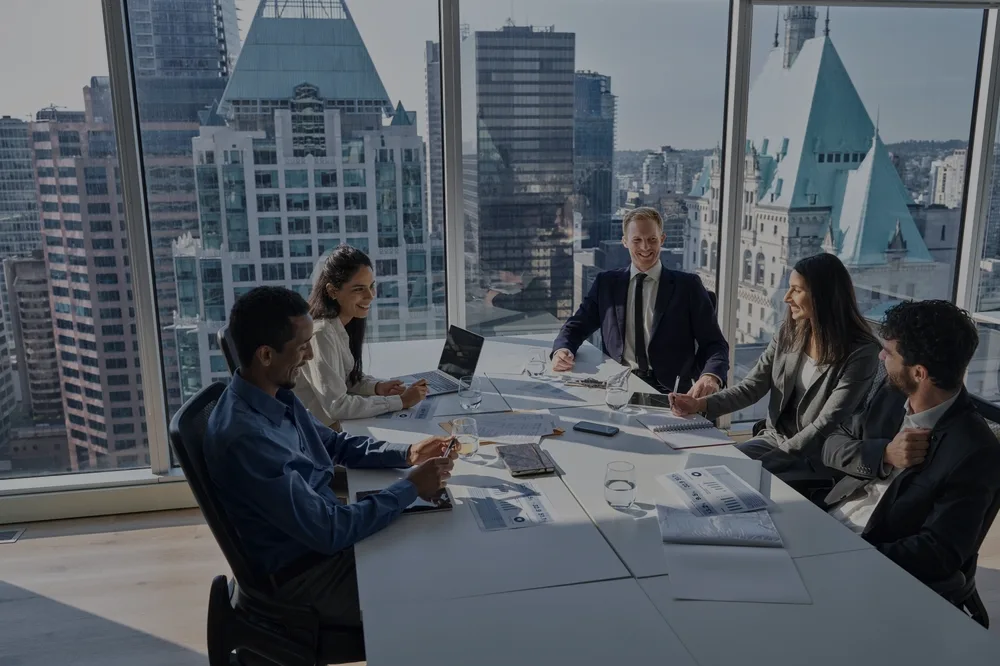 A leadership team working through digital risk priorities in the boardroom